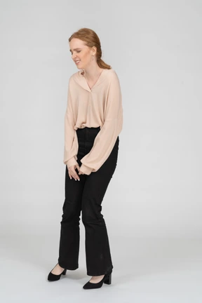 Woman in beautiful blouse standing