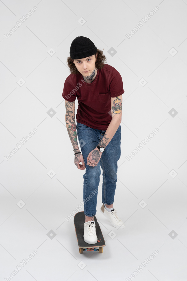 A skateboarding teenager