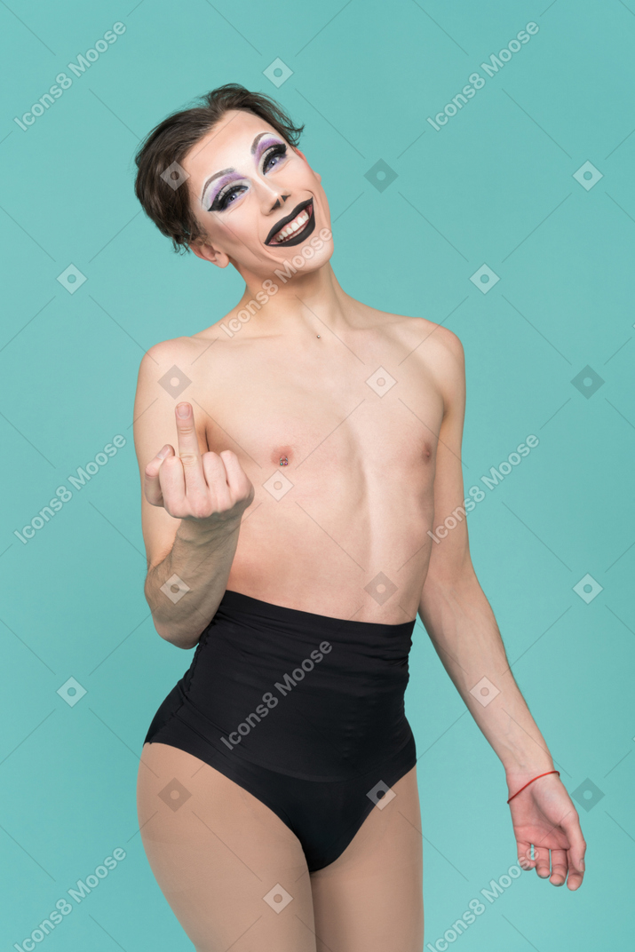Drag queen smiling and showing middle finger