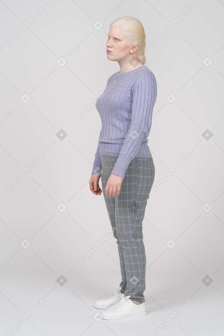 Annoyed young woman looking straight