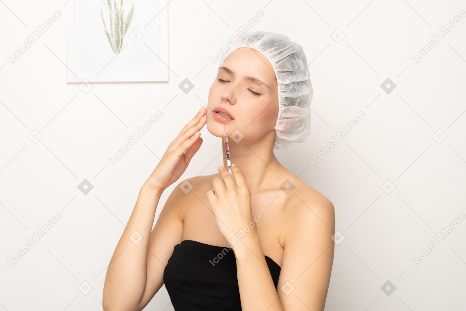 Young woman with syringe touching her face