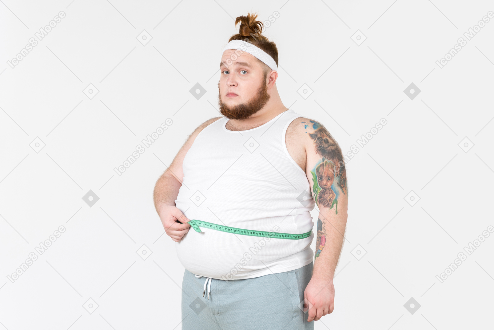 Big guy measuring his waist with cloth ruler