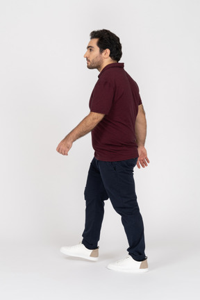 Side view of walking man