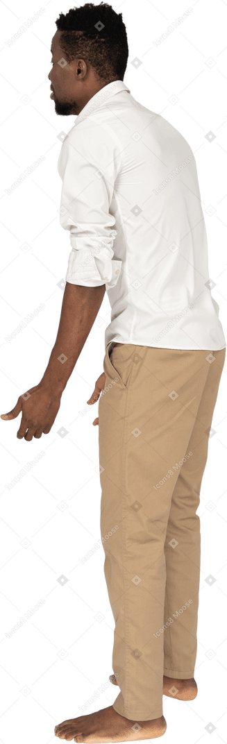 Man in white shirt standing