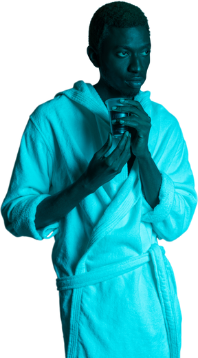 Young black man in white bathrobe