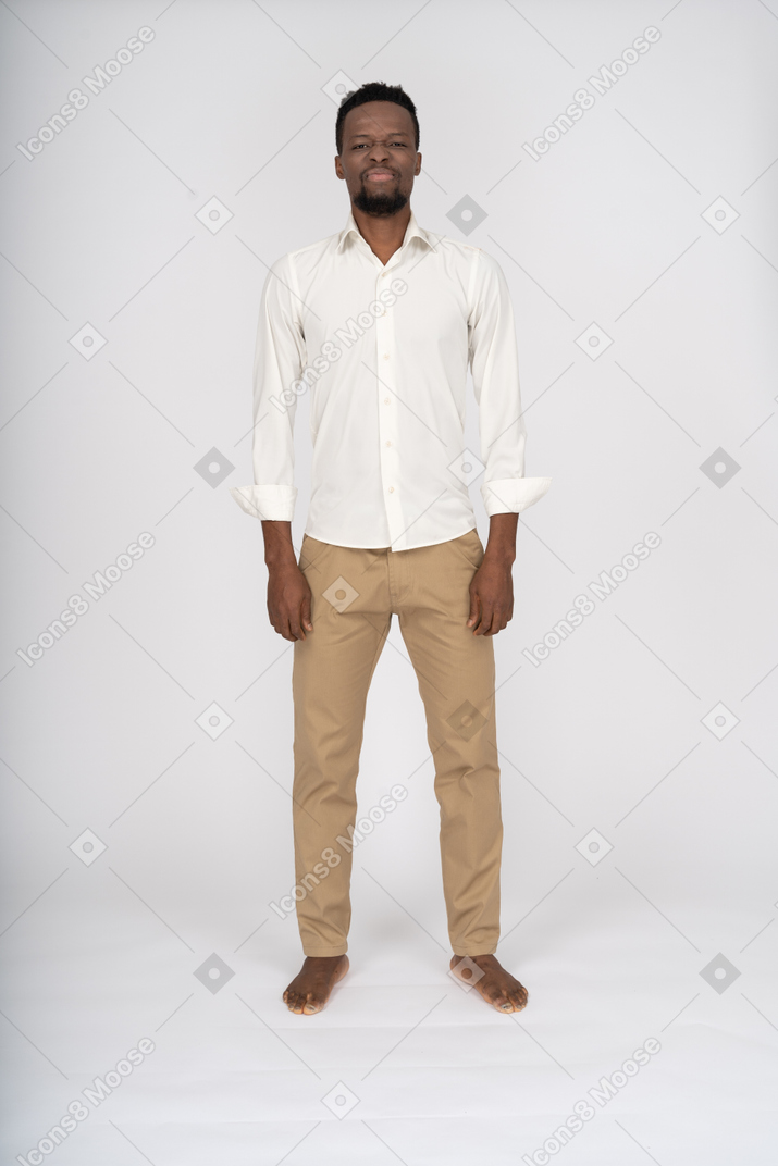 Man in white shirt standing