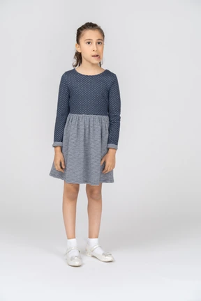 Front view of a girl biting lip absent-mindedly