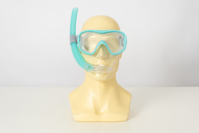 Swimming goggles on a mannequin head