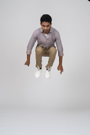 Man in casual clothes jumping