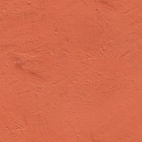 Concrete wall painted dark orange