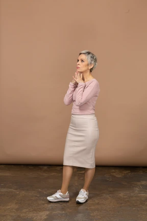 Side view of a thoughtful woman in casual clothes