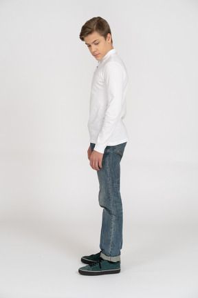 Young man in casual clothes standing