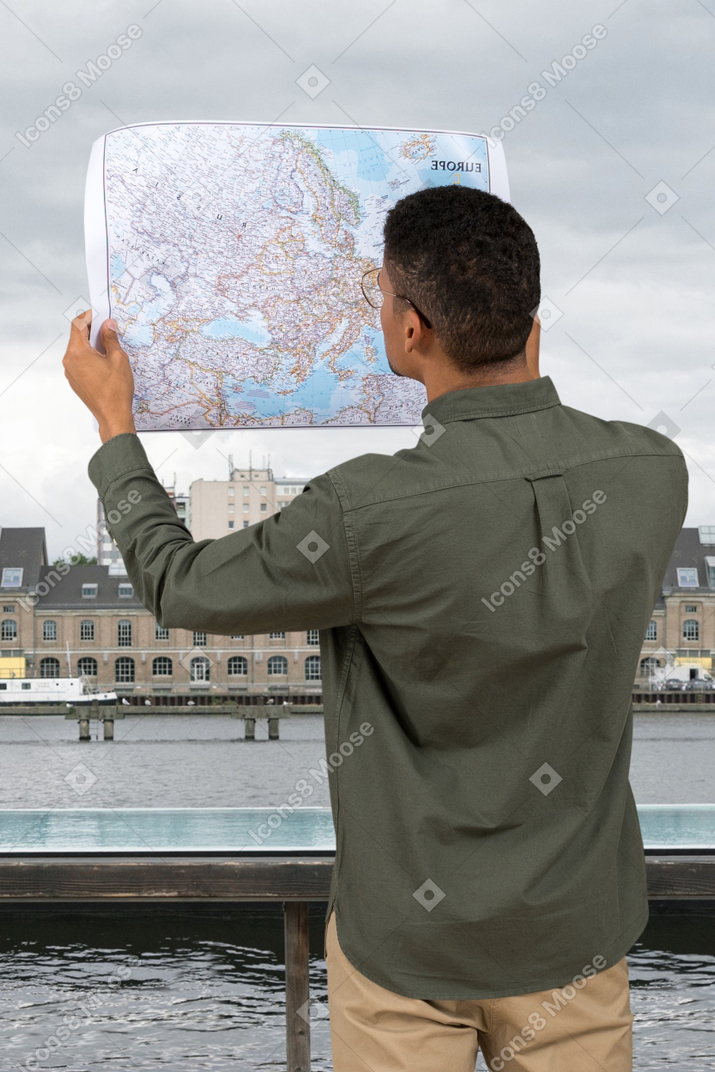 A man looks at a map