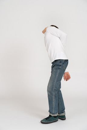 Young man in casual clothes standing