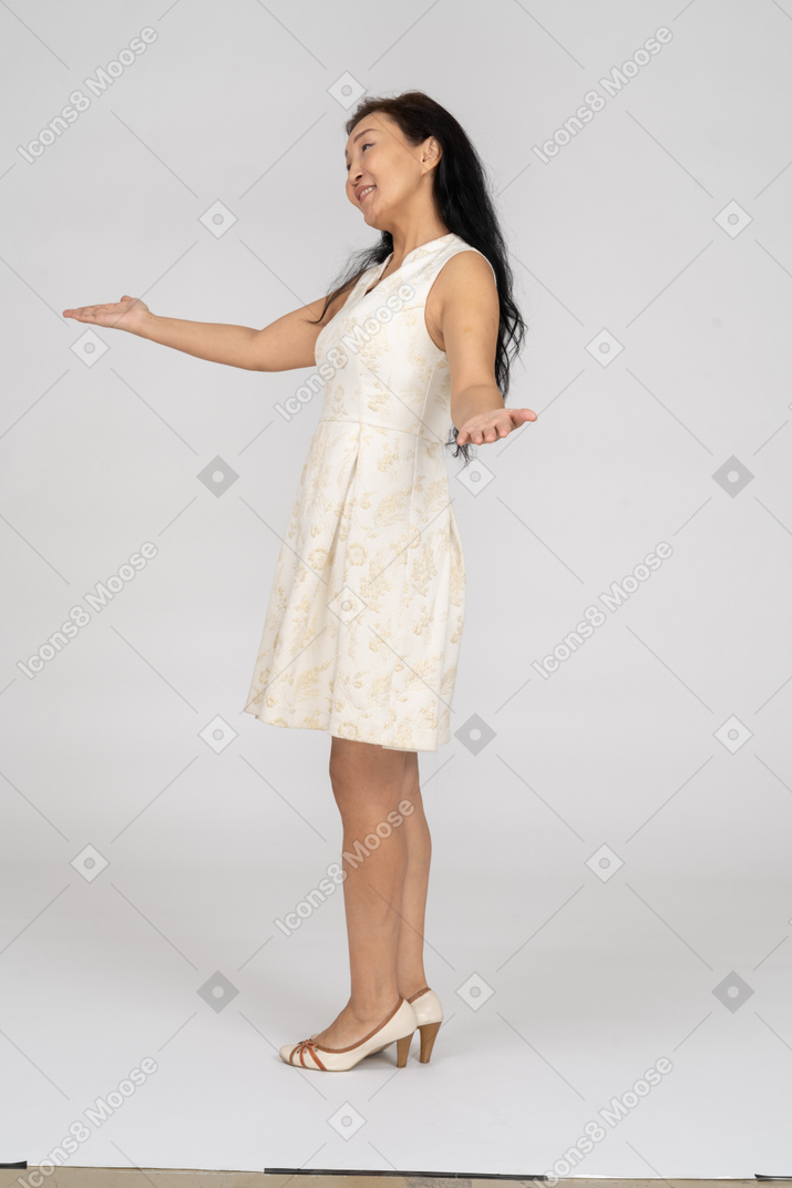 Woman in a white dress standing