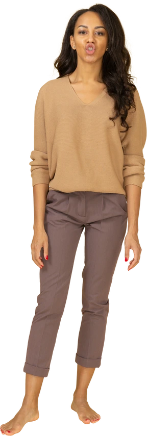 Front of a dark-skinned female saying something