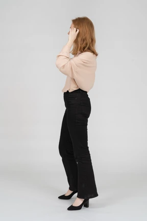 Woman in beautiful blouse standing