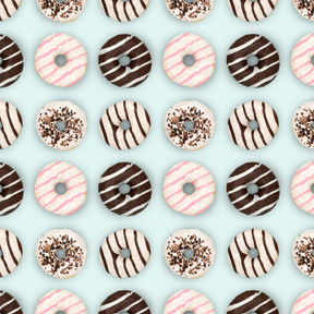 Glazed doughnuts over pink background