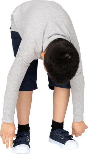 Front view of a boy leaning forward