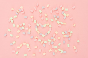 Colourful marshmallows arranged in the shape of heart