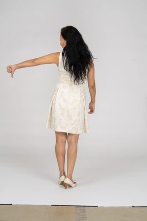 Woman in a white dress standing
