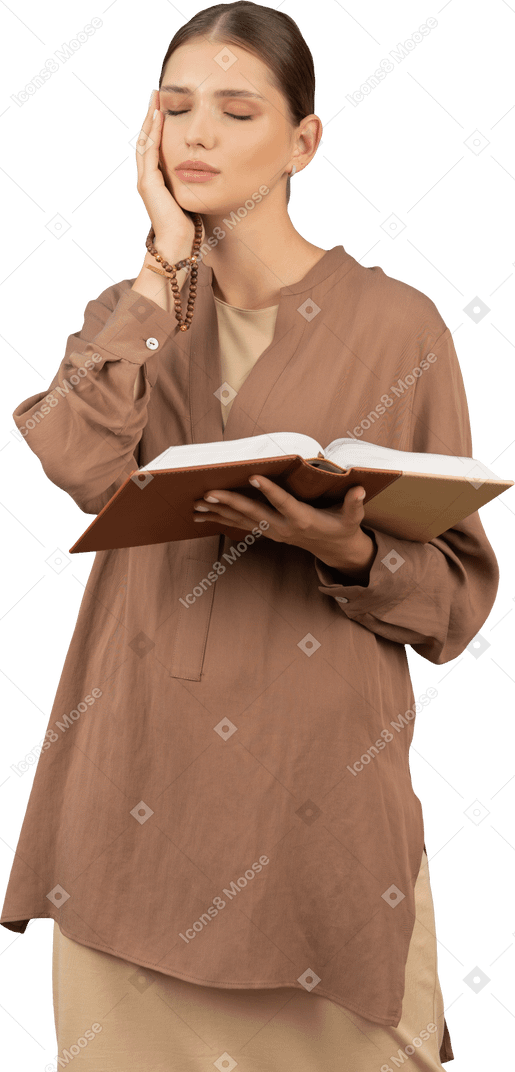 Young woman with book touching her