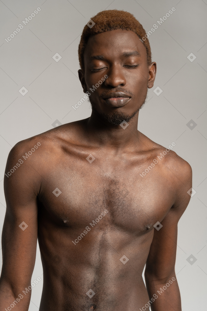 Portrait of topless man with closed eyes