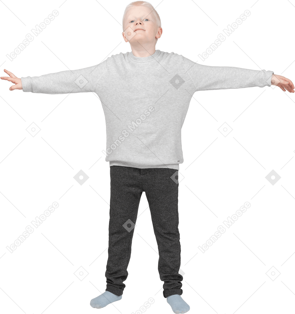 Front view of a boy standing in a star pose