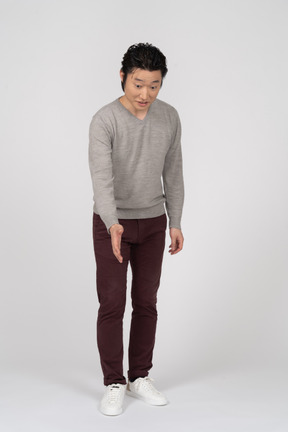 Man in casual clothes posing