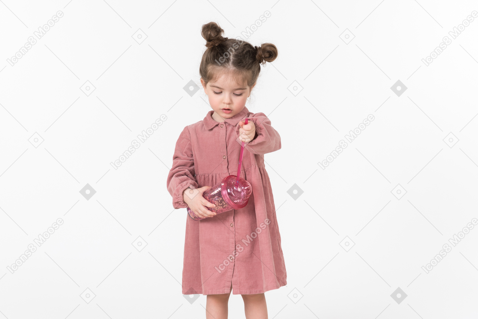 Little kid girl holding pink plastic cup