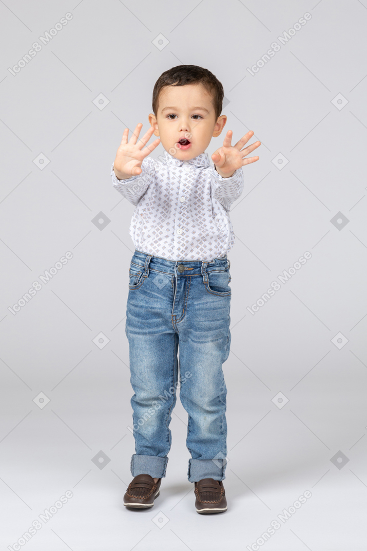 Cute little boy showing empty hands