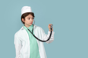Attractive teenage in a doctor's outfit