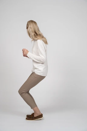 Woman in casual clothes standing