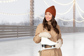 Young woman going to skate