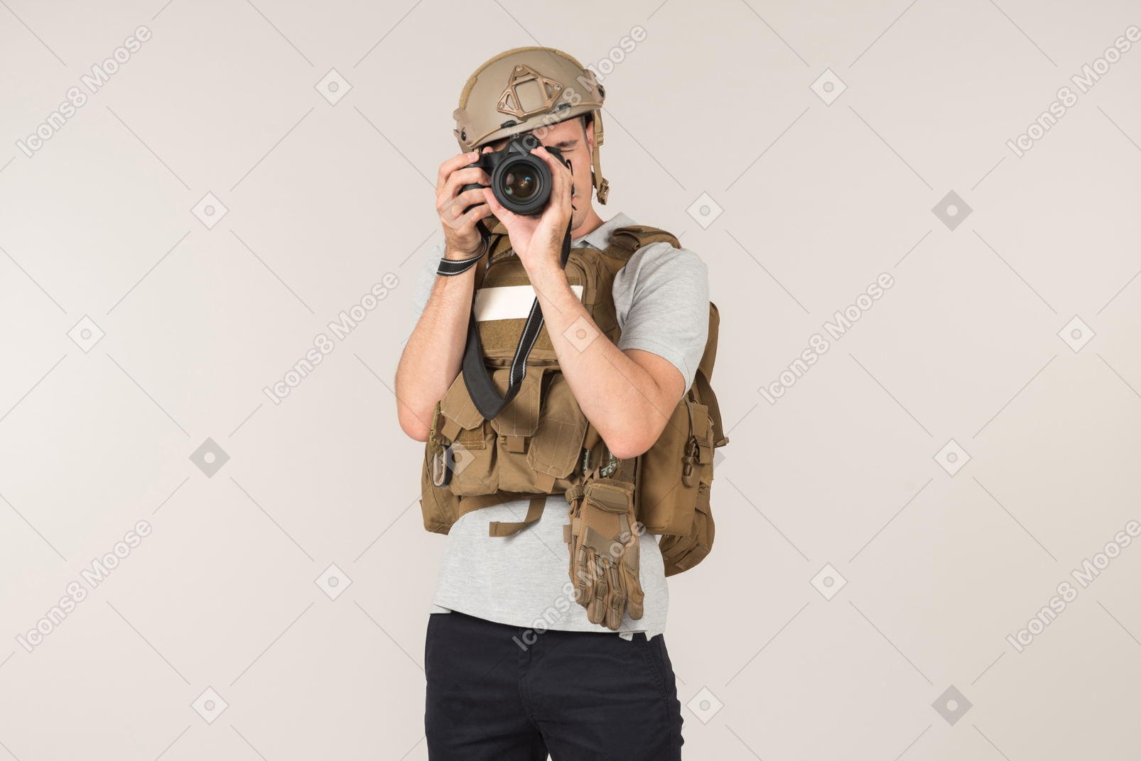 Male hot zone journalist making a photo with photo camera