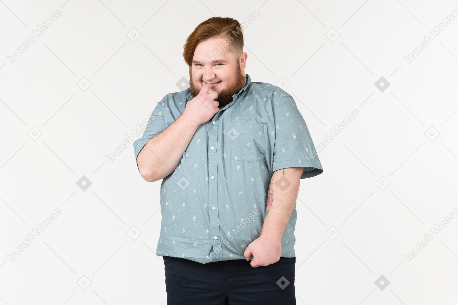 A fat man smiling shyly