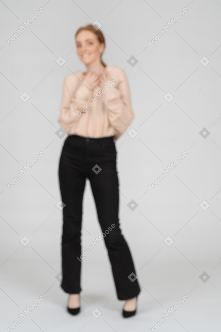 Woman in beautiful blouse standing