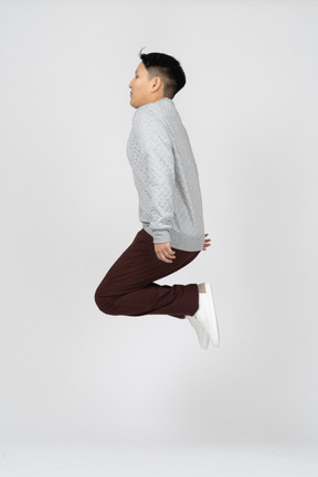 Man in casual clothes jumping