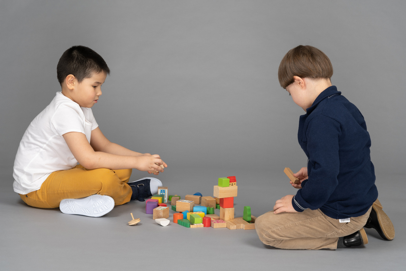 Kids playing with toy blocks