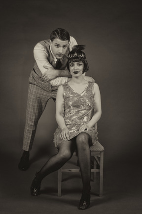 Full length black and white portrait of a retro-styled family