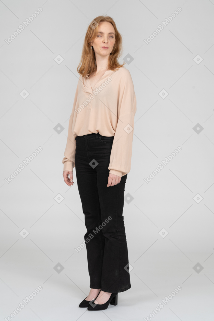 Woman in beautiful blouse standing