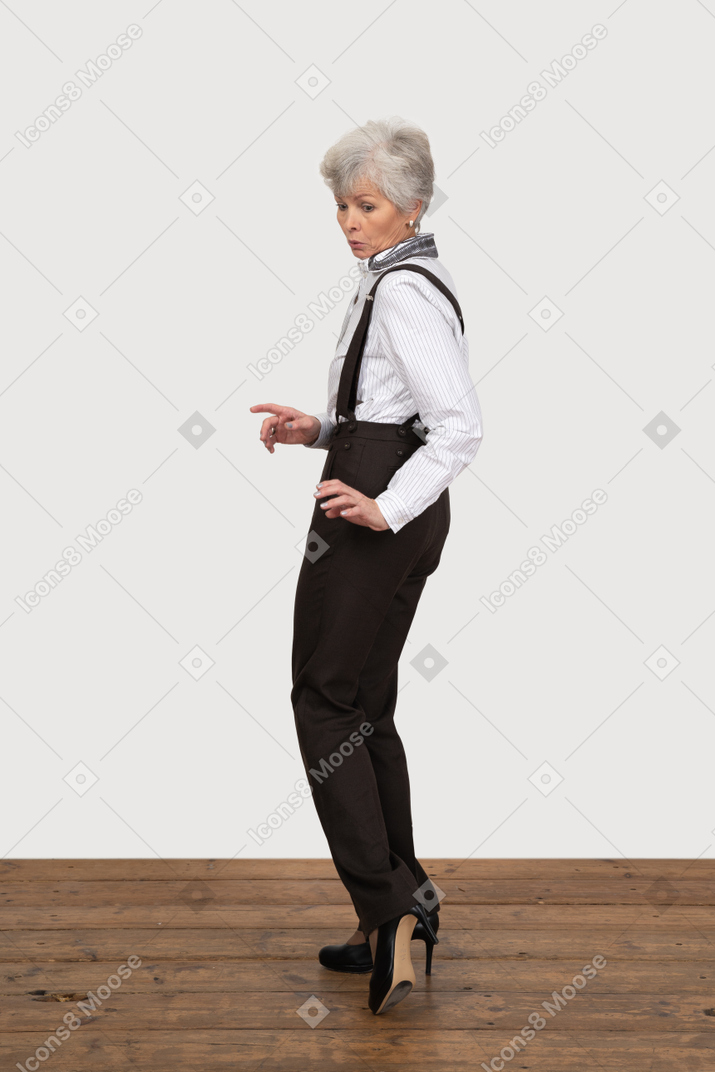 Side of a careful old lady on office clothing