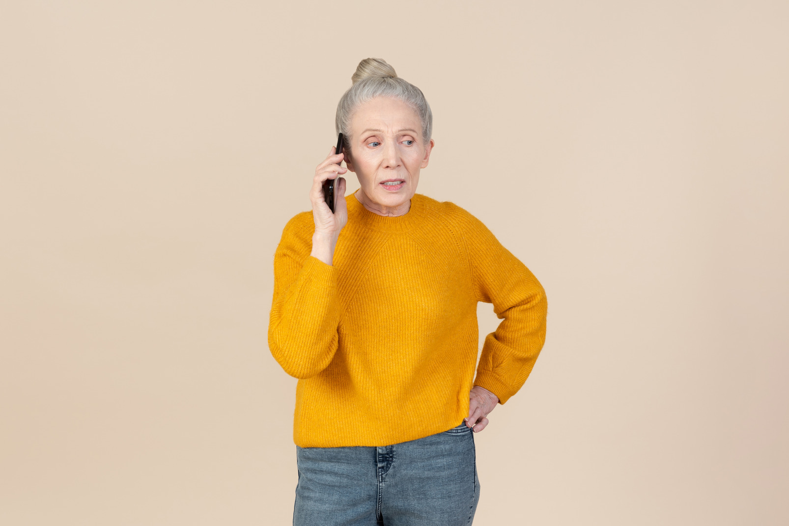 Aged woman involved in phone discussion