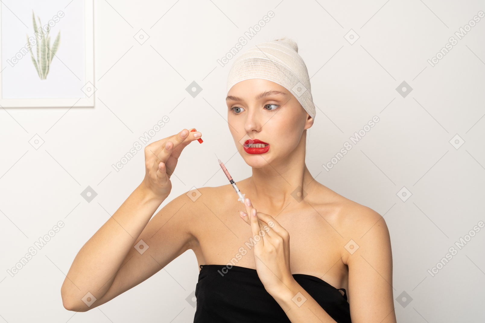 Young woman looking anxious while holding a syringe
