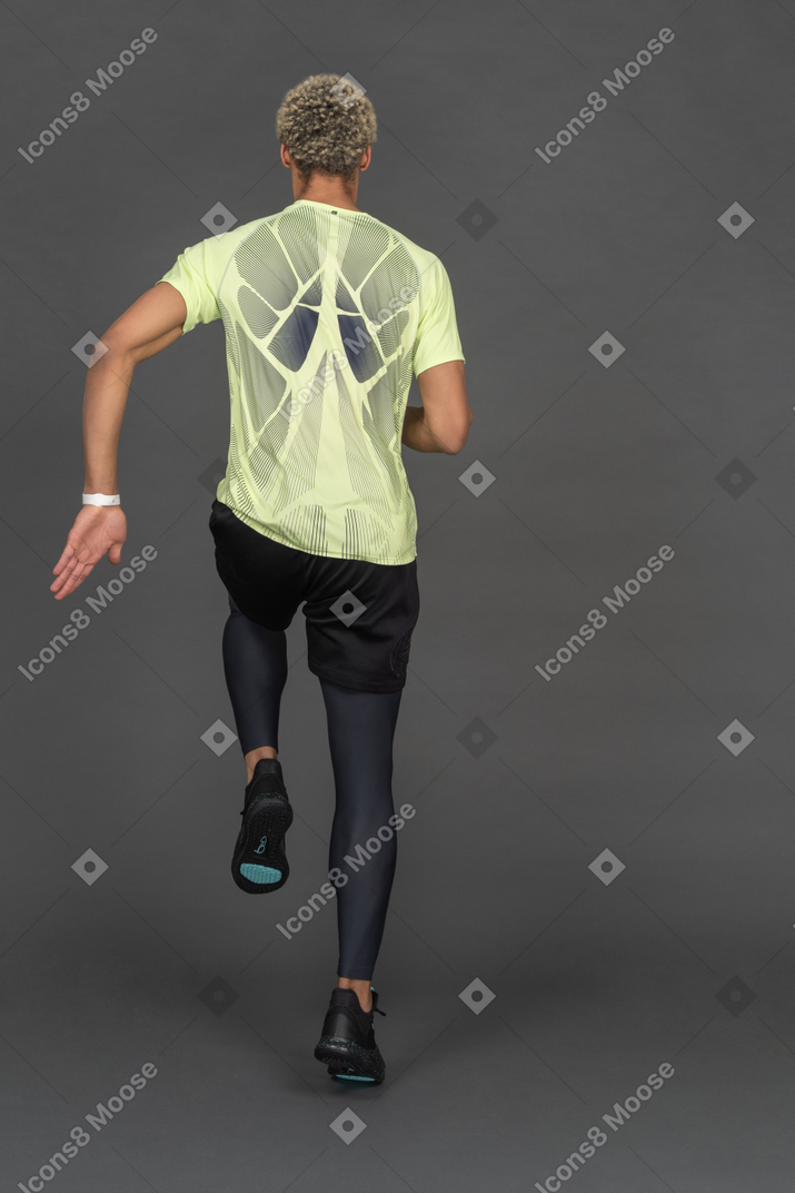 Back view of a man joggin