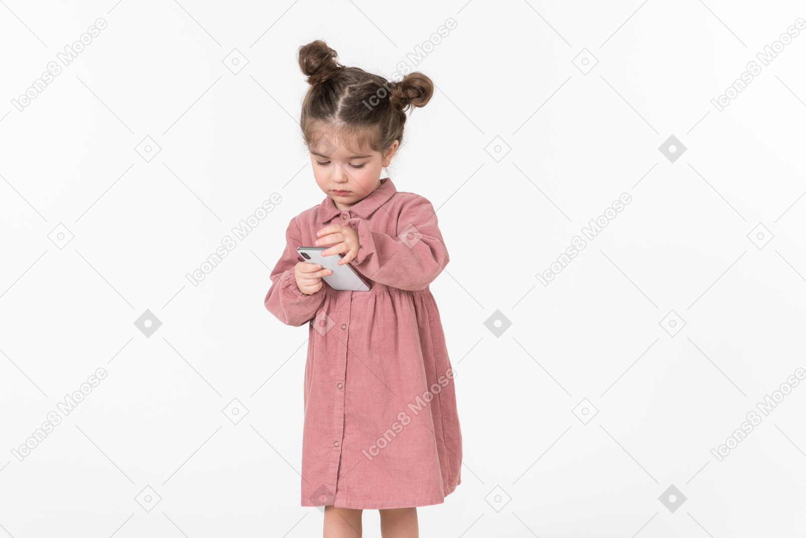 Little kid girl looking at smartphone