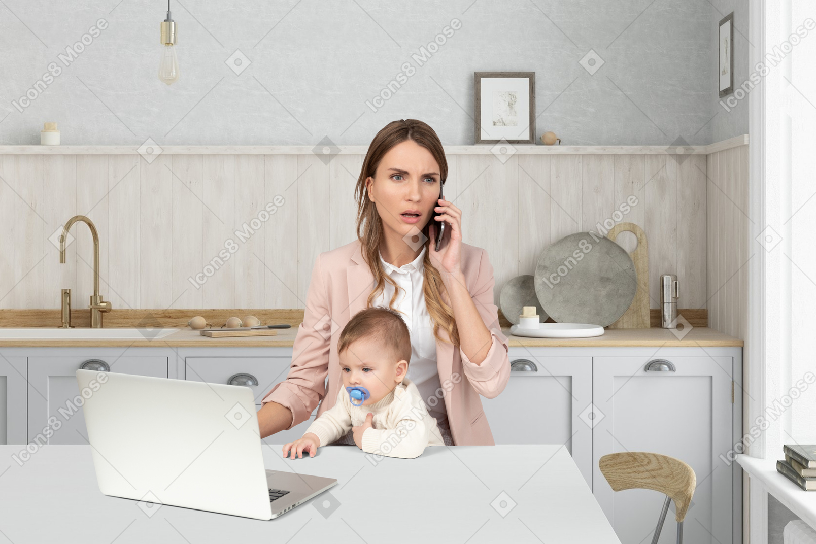 Mother with baby using a laptop