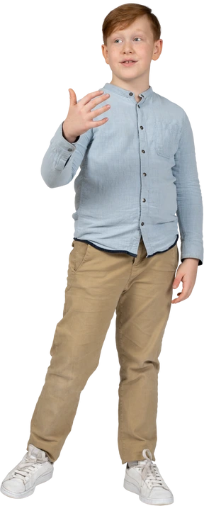 Front view of a boy explaining something