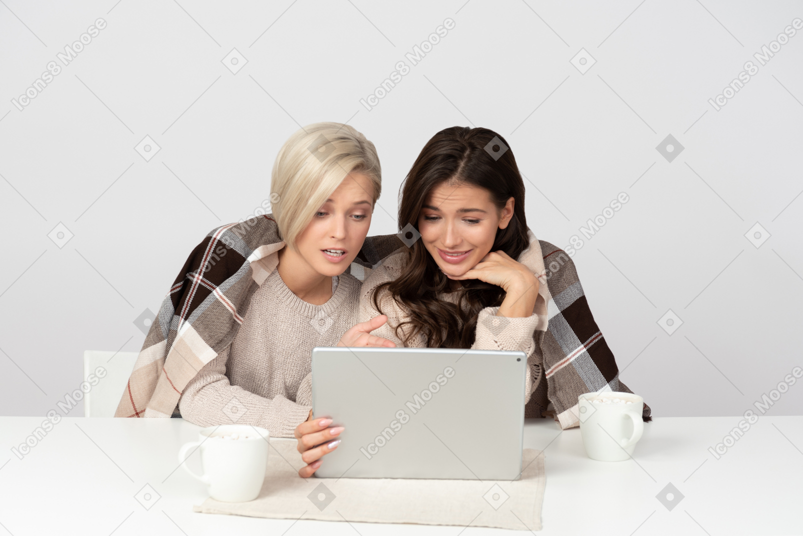 Young women watching movies and chatting