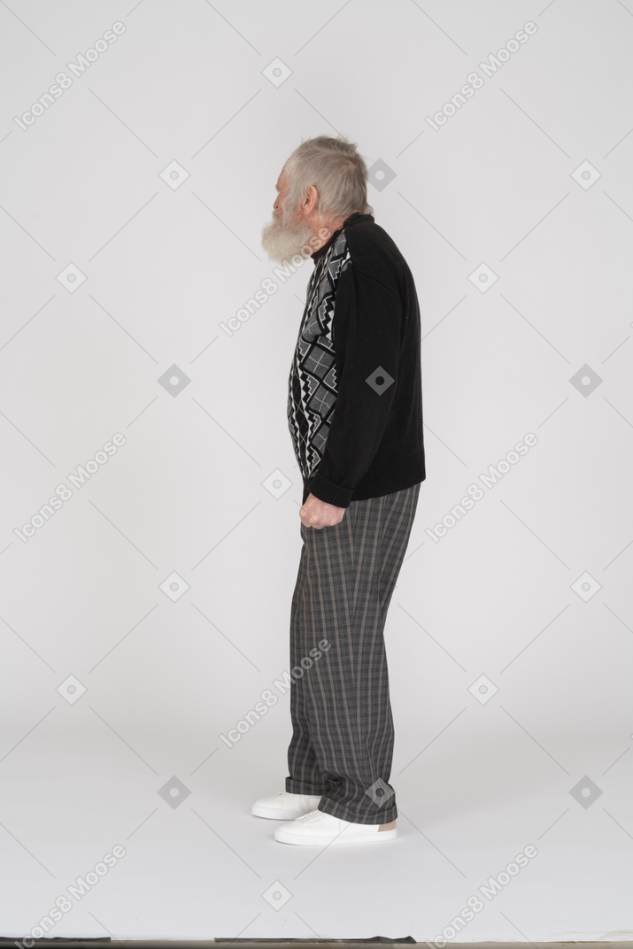 Side view of old man standing